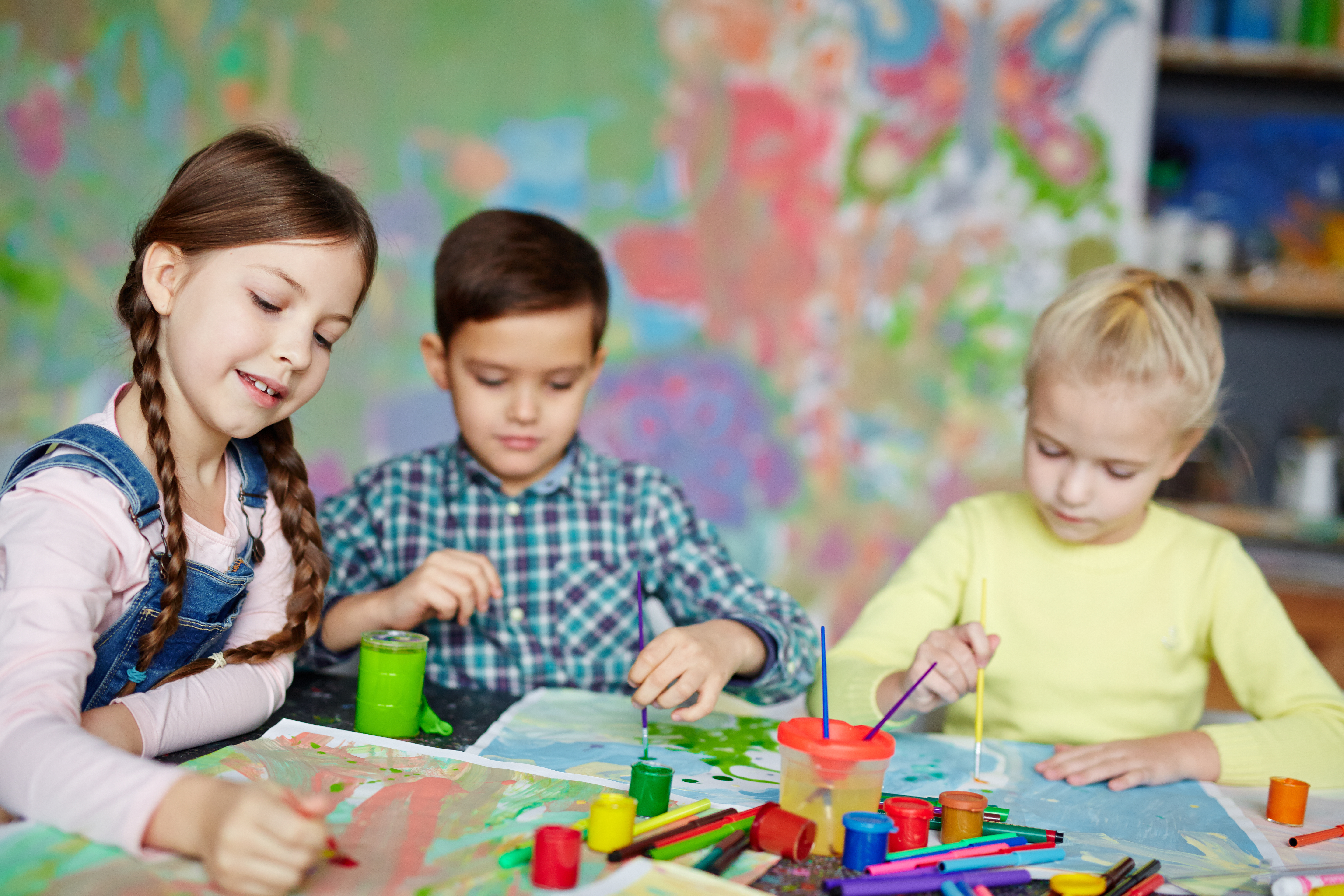 Three Kids Painting